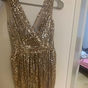 Selling this beautiful dress never wore! Perfect for weddings or event.